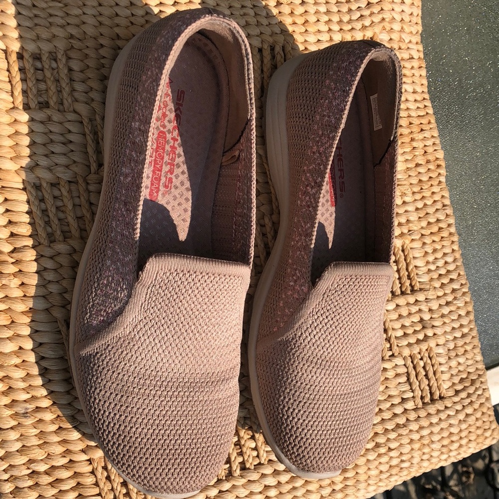 Women’s Skecher slip on shoes.